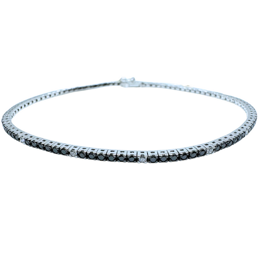 Pulsera de tenis Mirco Visconti en oro blanco con diamantes blancos y negros alternados