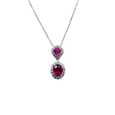 Collana Bibigi' In Oro Bianco Con Doppio Pendente Con Rubini Taglio Brillante E Ovale E Contorno Di Diamanti