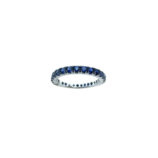 Anillo Iannelli de oro blanco hecho a mano con puntas bruñidas y zafiros
