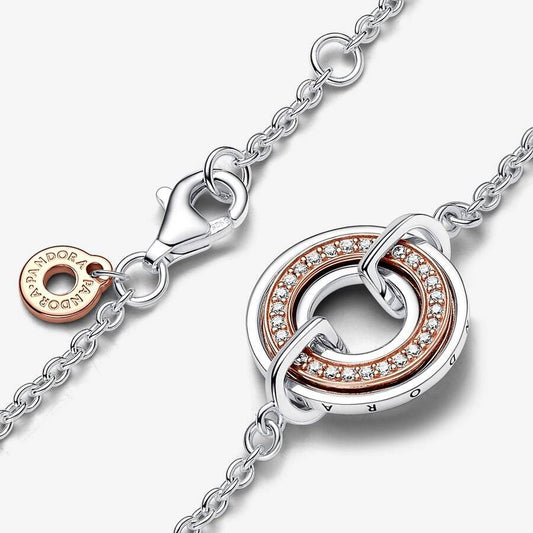 Pulsera Pandora de círculo bicolor con logotipo y pavé