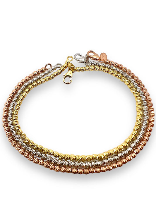 Bracciale Tre Ori 18kt con Sfere Diamantate