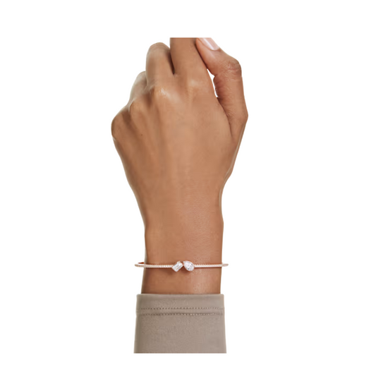 Pulsera rígida Swarovski Mesmera con baño de oro rosa