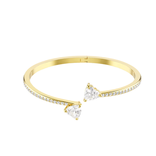 Pulsera rígida Swarovski Mesmera Attract con baño de oro amarillo