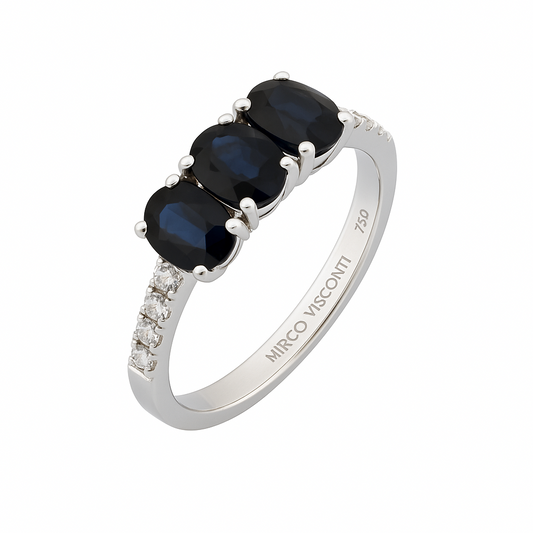 Anillo Trilogy de Mirco Visconti con esmeraldas, zafiros y diamantes