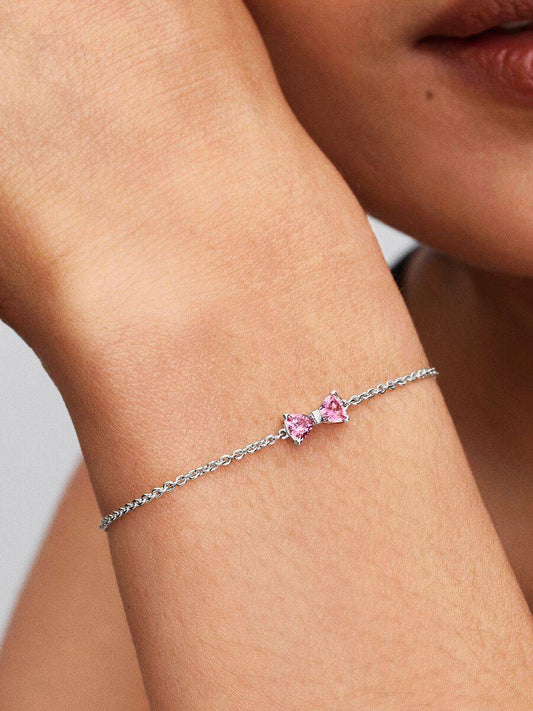 Pulsera Pandora con lazo rosa brillante
