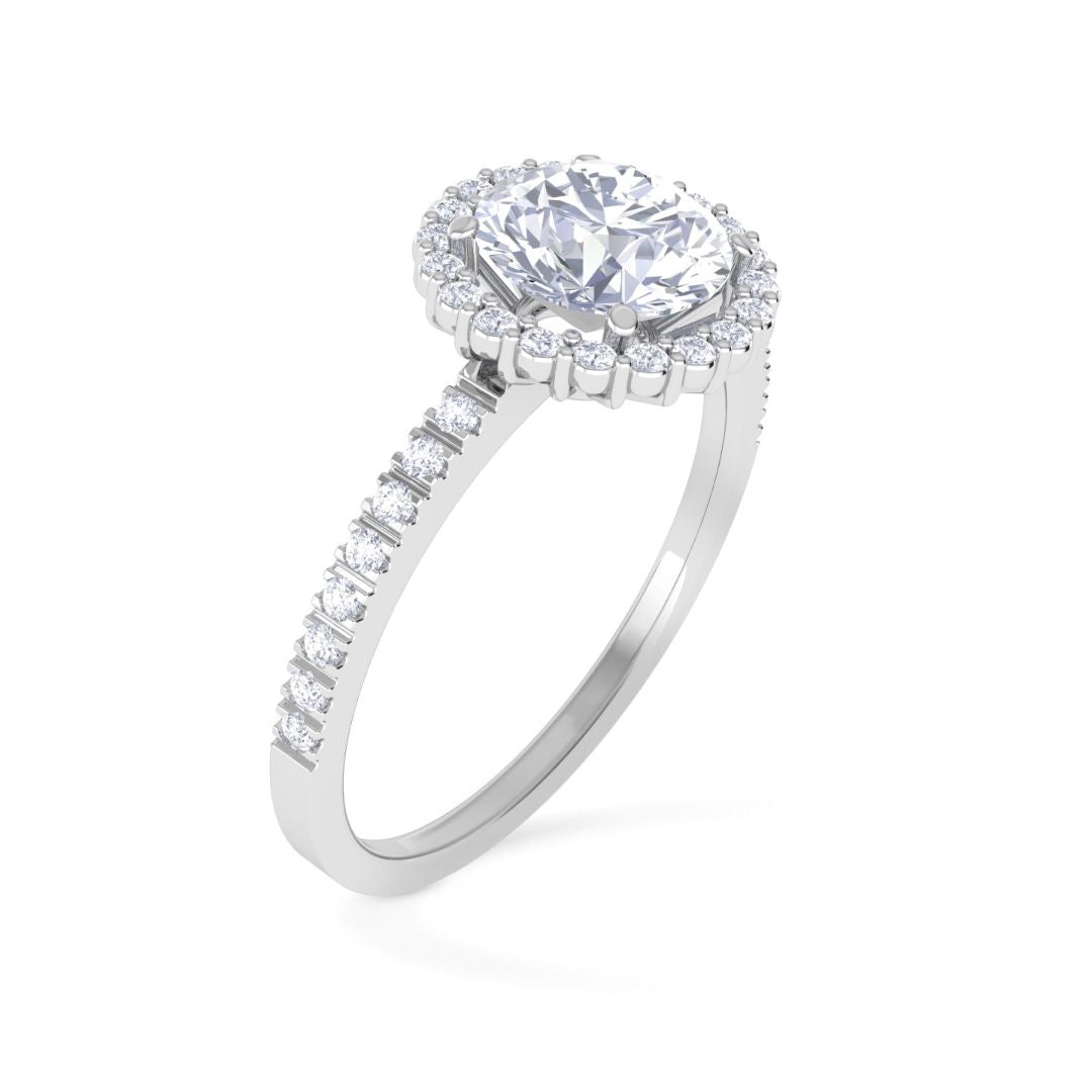 Solitaire Ring with Diamonds on the Shank in 18 KT White Gold and Central Diamond 0.70 ct.