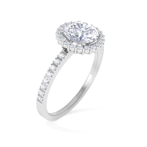 Solitaire Ring with Diamonds on the Shank in 18 KT White Gold and Central Diamond 0.70 ct.