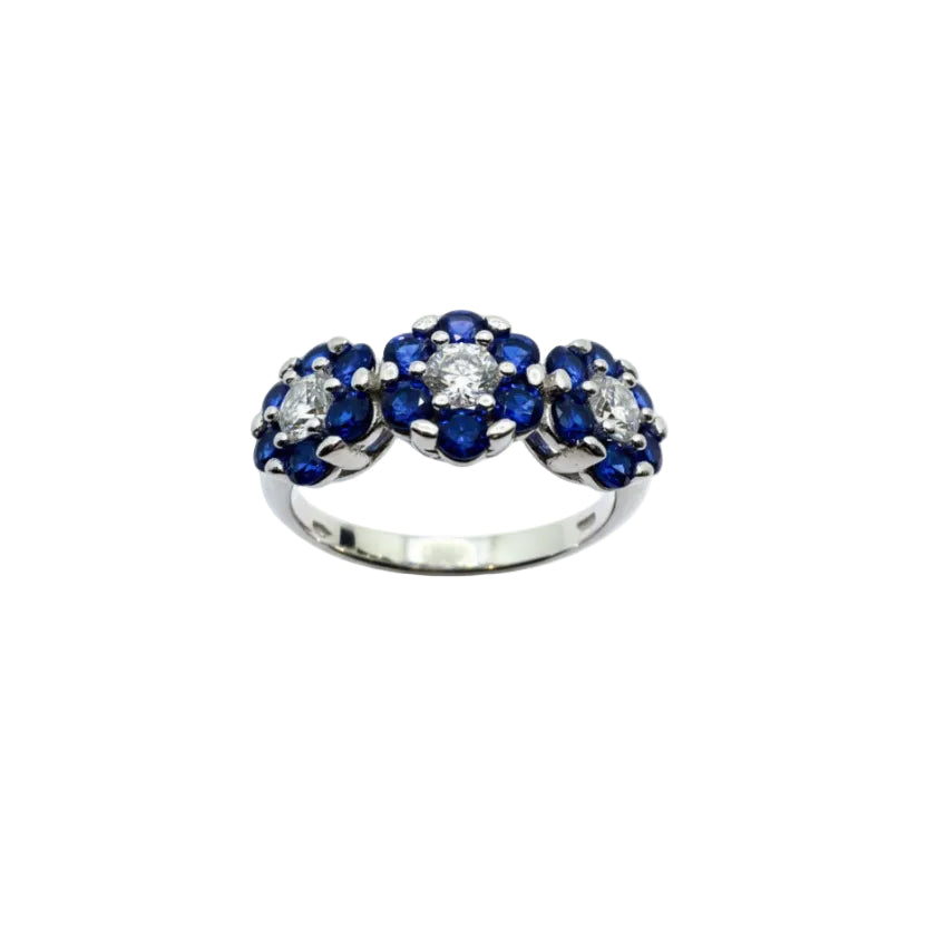 Anello Trilogy in Oro Bianco 18 KT con Fiori Magic con Zirconi Bianchi e Blu AN084