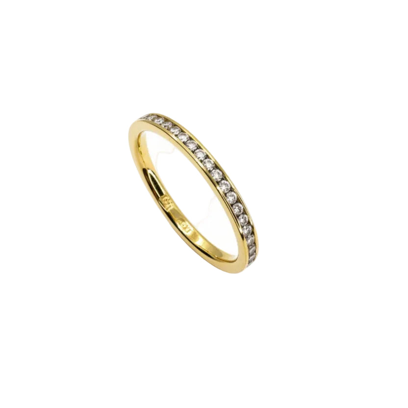 Anillo de oro amarillo de 18 quilates con diamantes engastados en canal