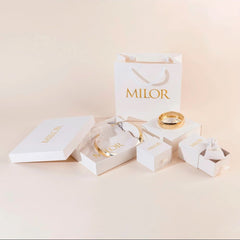 Pendientes de botón de corazón sinuoso Milor Gold con circonitas cúbicas en oro amarillo 375