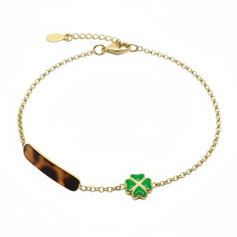 Pulsera de bebé en oro amarillo de 18 quilates con placa y trébol de cuatro hojas esmaltado en verde