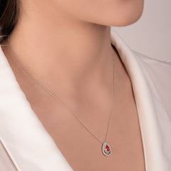 Mirco Visconti Necklace with Drop-Cut Ruby Pendant and Double Diamond Surround