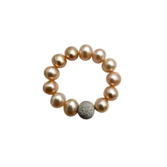 Anillo elástico con perlas de agua dulce de 5,5 mm y esfera de oro blanco con corte de diamante