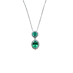 Collar Bibigi' de oro blanco con colgante de esmeraldas de talla ovalada y diamantes